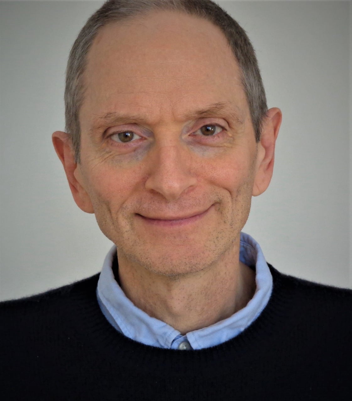 Headshot of Arthur Holden